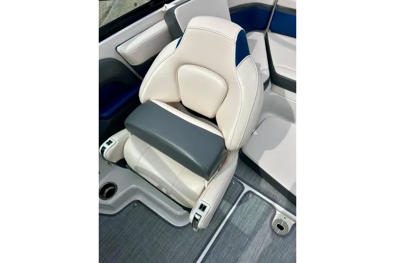 Slide: The Image of 2017 Chaparral 203 Vortex boat seat, featuring sleek white and gray upholstery. - 77
