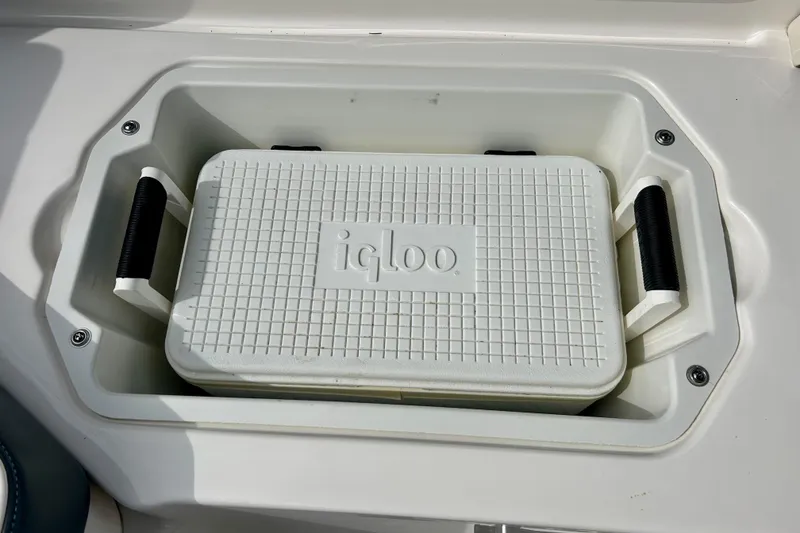 Slide: The Image of Built-in cooler compartment on 2017 Chaparral 203 Vortex boat with Igloo cooler. - 89