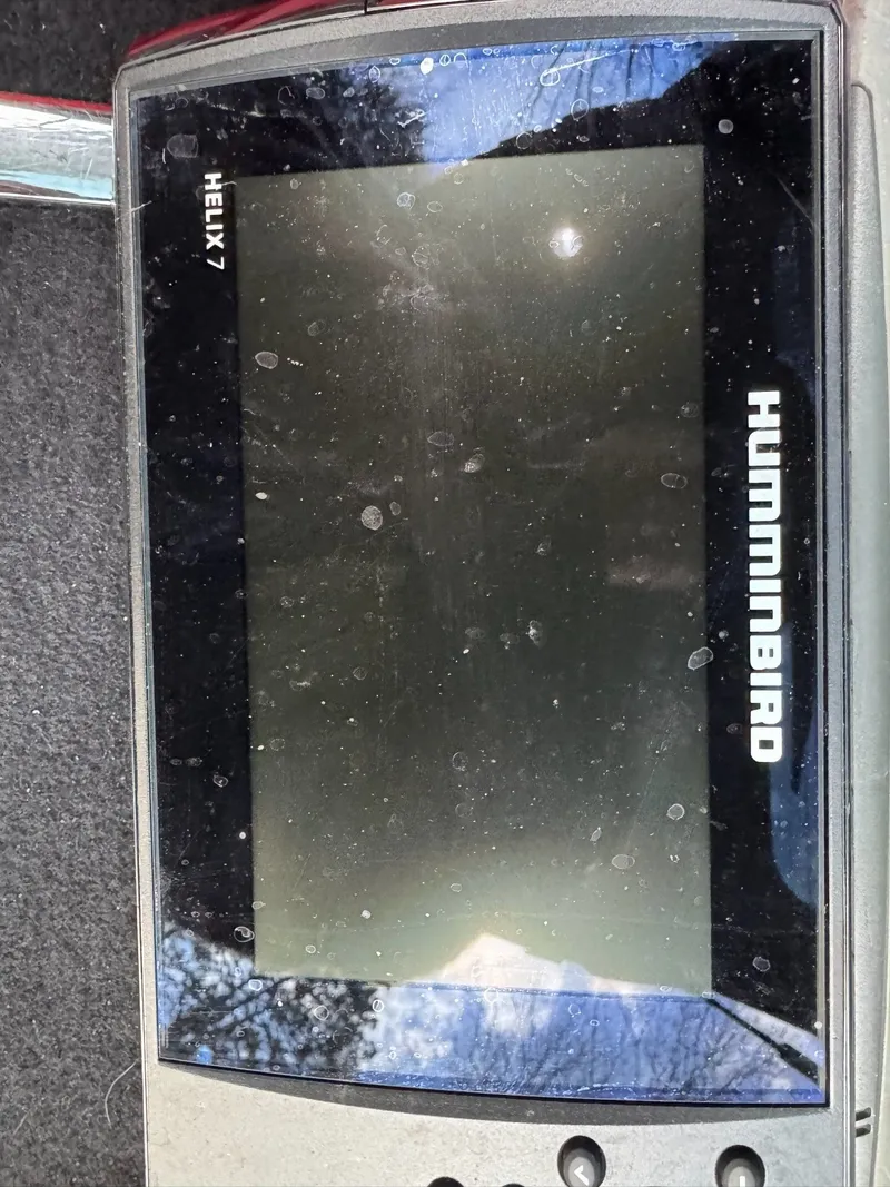 Slide: The Image of Humminbird Helix 7 fish finder on MirroCraft 1686 boat, 2024 model. - 13