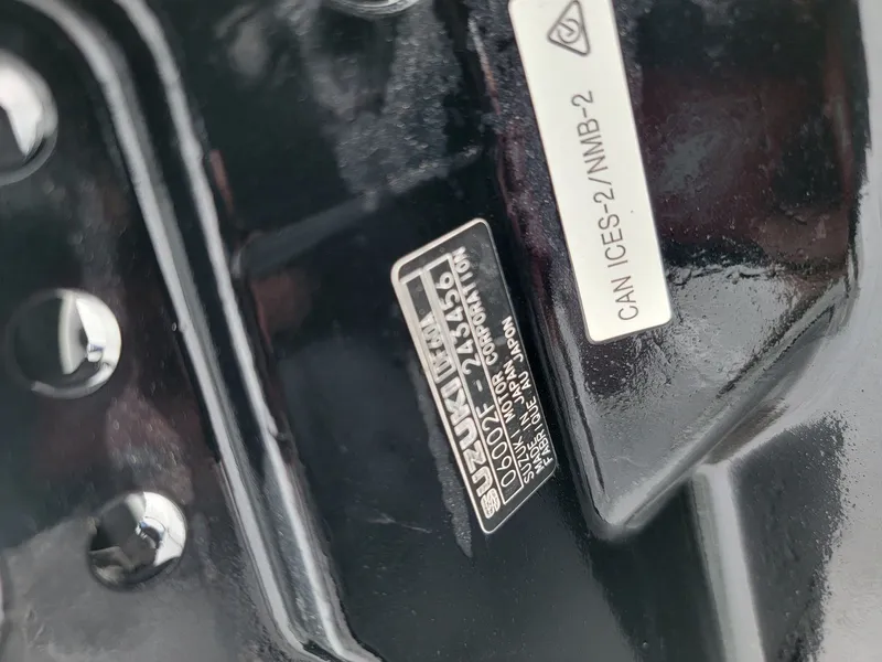 Slide: The Image of Close-up of a Suzuki engine part with serial number. - 17