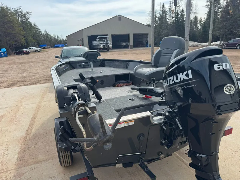 Slide: The Image of 2024 MirroCraft 1686 boat with Suzuki 60 HP engine. - 5