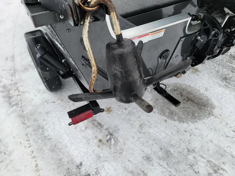 Slide: The Image of 2024 MirroCraft 1686 boat hull on snowy ground. - 9