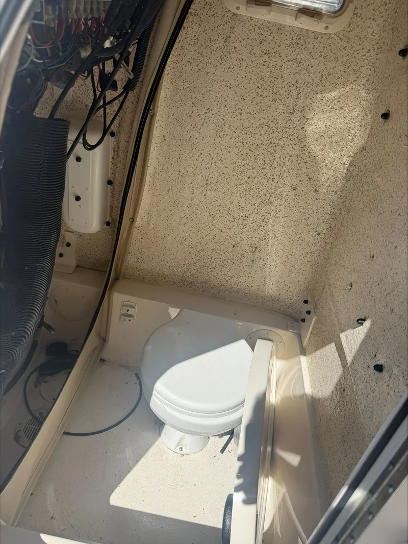 Slide: The Image of Interior of 2023 Sea Chaser 24 HFC with toilet. - 10
