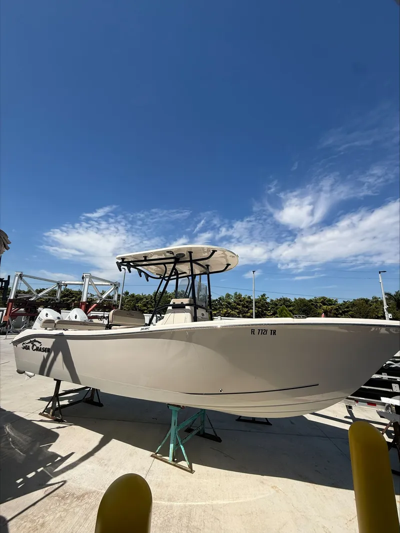 Slide: The Image of 2023 Sea Chaser 24 HFC boat on a trailer under blue sky. - 3