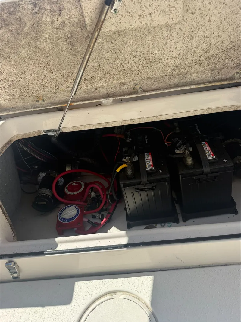 Slide: The Image of Battery compartment of a 2023 Sea Chaser 24 HFC boat. - 9