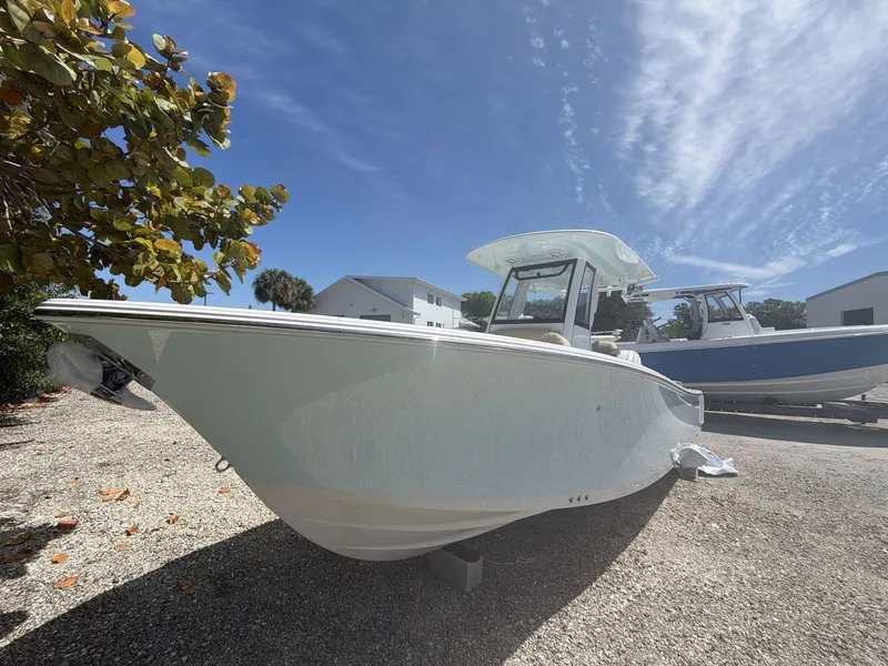 Slide: The Image of 2026 Sportsman Heritage 231 Center Console boat outdoors. - 10