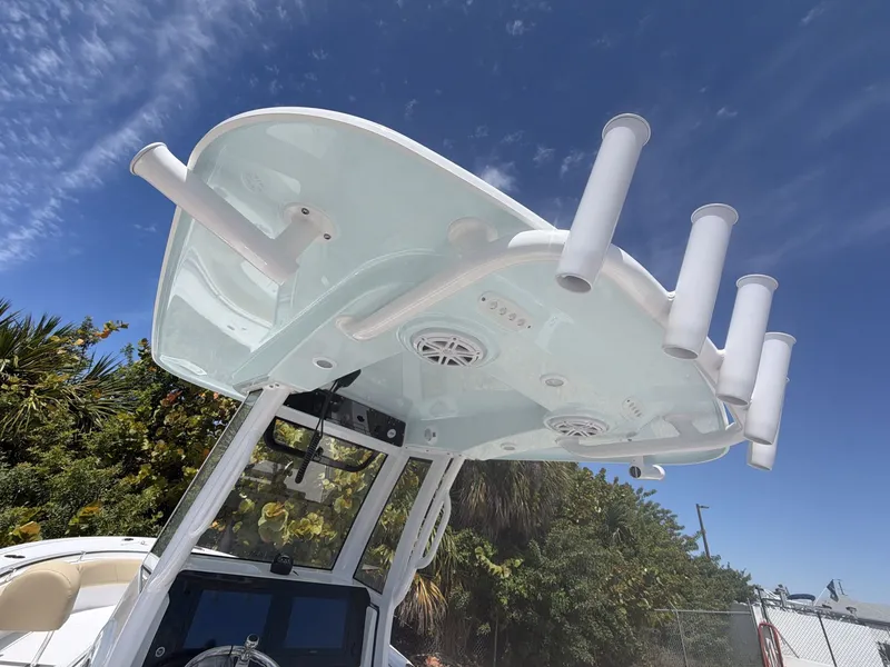 Slide: The Image of Sportsman Heritage 231 Center Console 2026 with T-top and rod holders. - 11