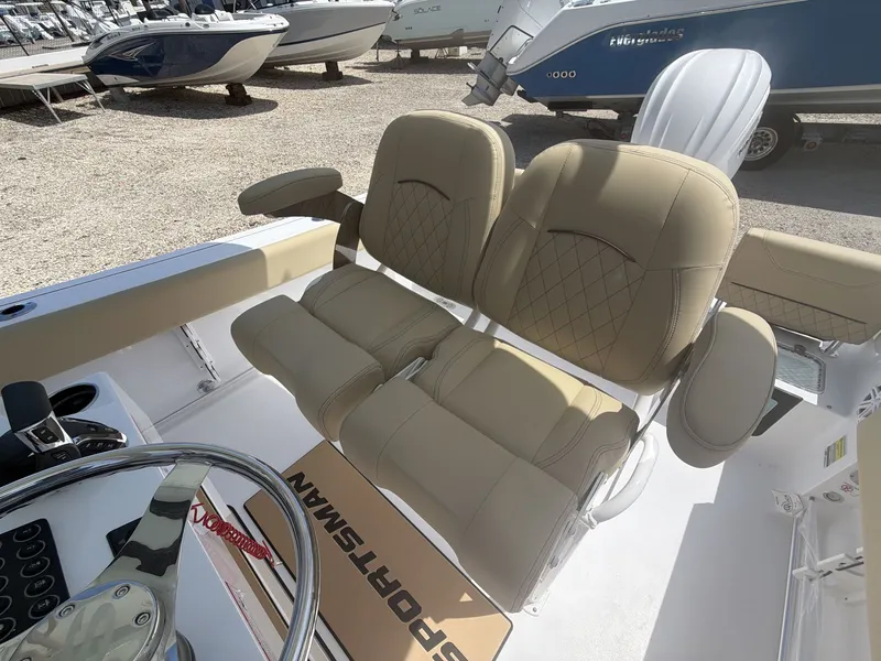 Slide: The Image of 2026 Sportsman Heritage 231 Center Console with beige seating. - 20
