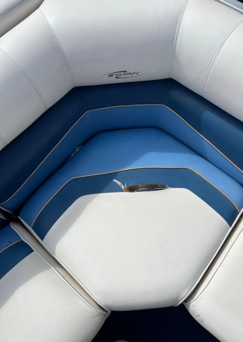 Slide: The Image of Damaged seat of a 2001 Sylvan 8526 Capri boat. - 14
