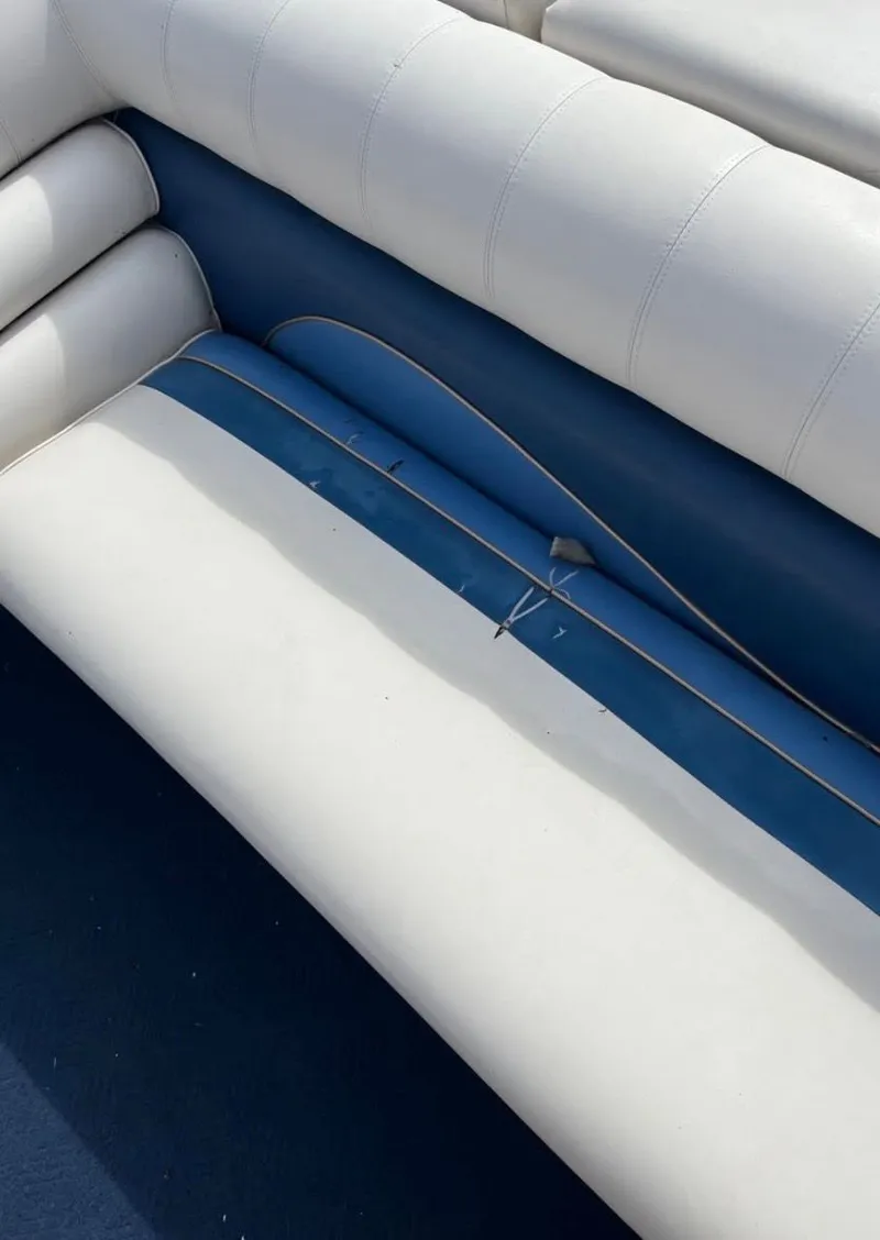 Slide: The Image of Sylvan 8526 Capri 2001 boat seat with blue and white upholstery. - 15