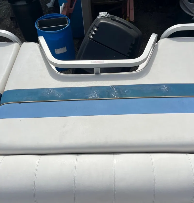 Slide: The Image of Sylvan 8526 Capri 2001 boat seat with blue upholstery. - 16