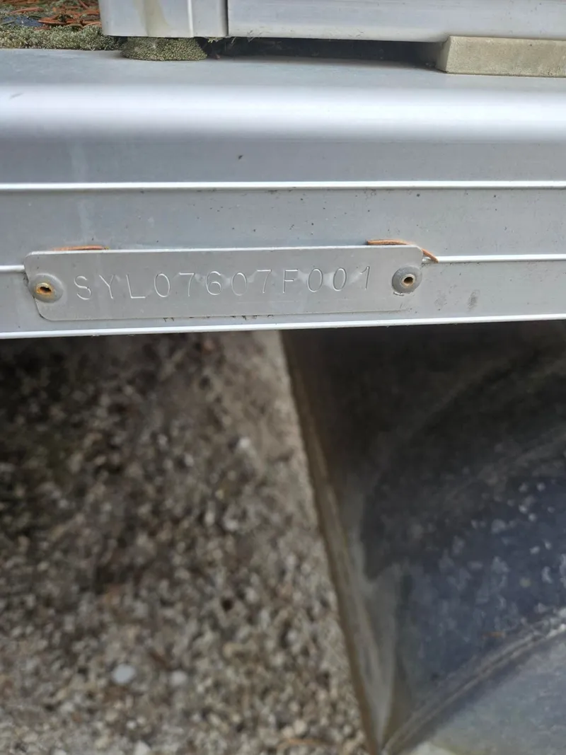 Slide: The Image of Sylvan 8526 Capri 2001 serial number on metal plate. - 21