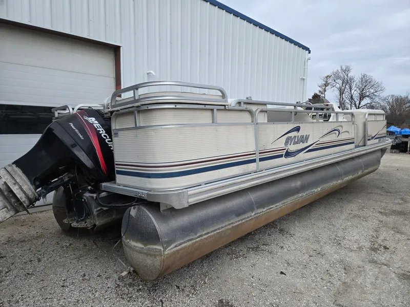 Slide: The Image of 2001 Sylvan 8526 Capri pontoon boat with outboard motor. - 5