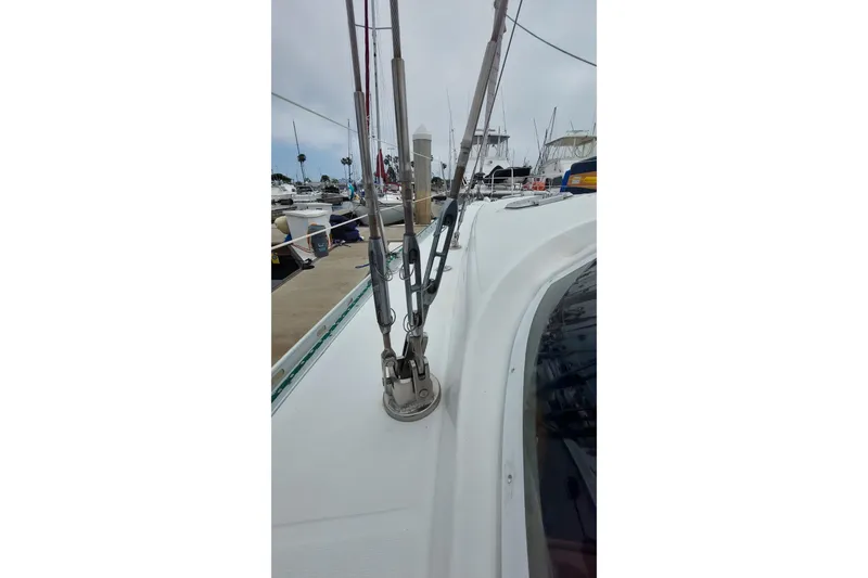 Slide: The Image of Jeanneau Sun Odyssey 43 DS sailboat deck, 2002 model, docked at marina. - 20