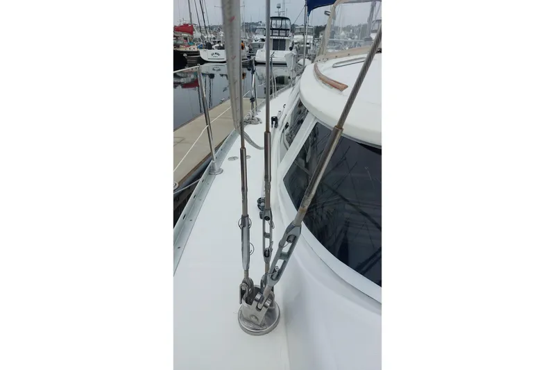 Slide: The Image of Deck view of 2002 Jeanneau Sun Odyssey 43 DS sailboat in marina. - 21