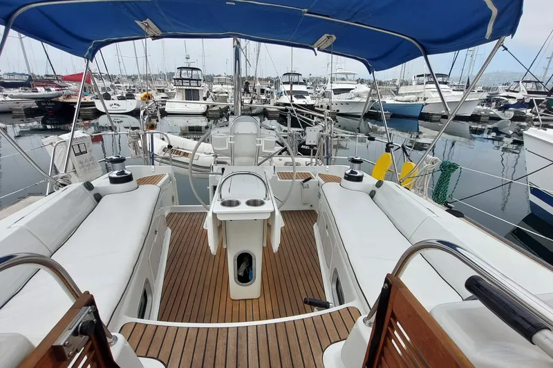 Slide: The Image of Cockpit view of 2002 Jeanneau Sun Odyssey 43 DS sailboat in marina. - 29