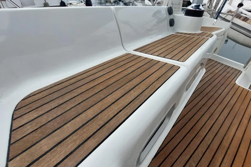 Slide: The Image of Teak deck of 2002 Jeanneau Sun Odyssey 43 DS sailboat, showcasing elegant design. - 35