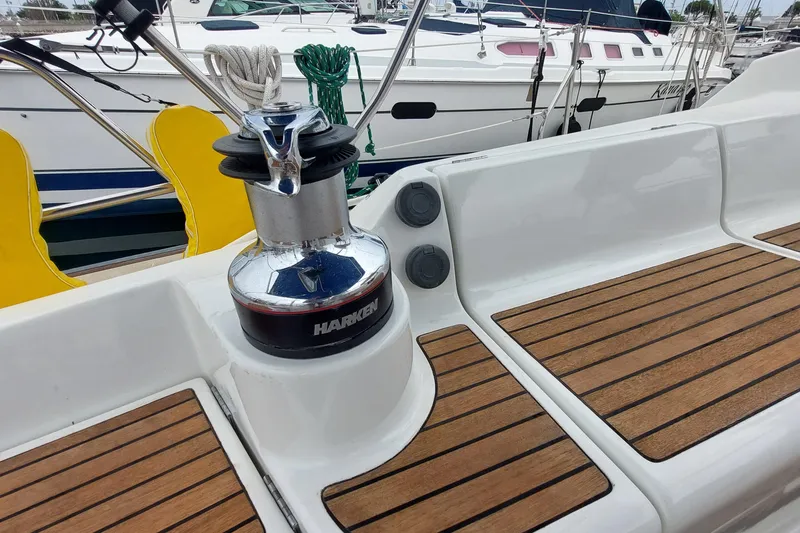Slide: The Image of Deck of 2002 Jeanneau Sun Odyssey 43 DS with Harken winch and teak flooring. - 37