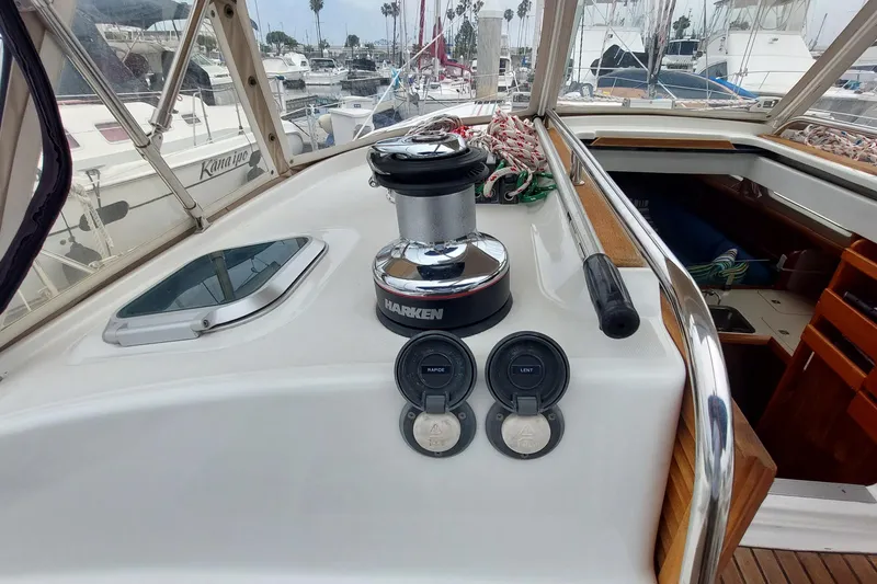 Slide: The Image of Cockpit view of 2002 Jeanneau Sun Odyssey 43 DS sailboat with winch and controls. - 39