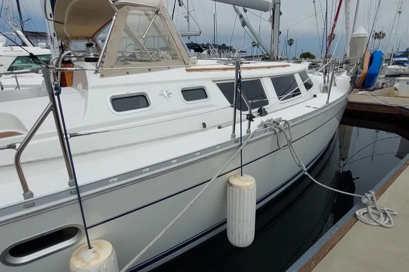 Slide: The Image of 2002 Jeanneau Sun Odyssey 43 DS sailboat docked at marina. - 4