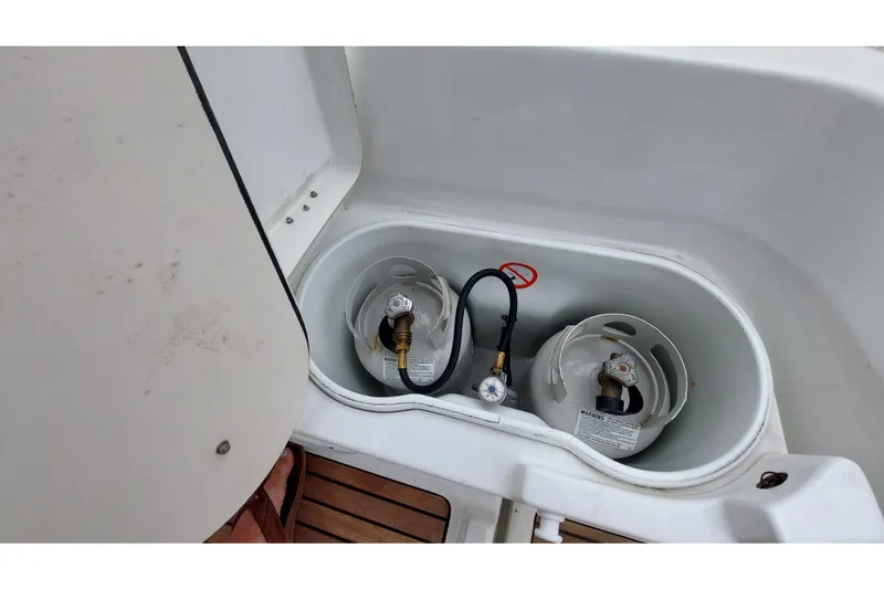 Slide: The Image of Gas cylinder storage on Jeanneau Sun Odyssey 43 DS, 2002 model. - 44