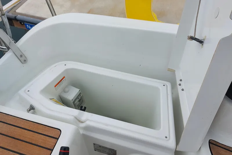 Slide: The Image of Open storage compartment on 2002 Jeanneau Sun Odyssey 43 DS sailboat deck. - 45