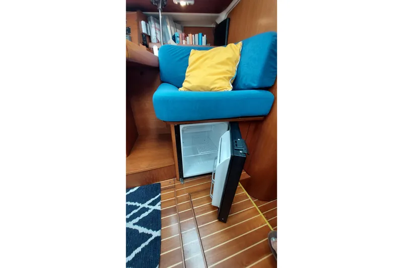 Slide: The Image of Spare frige under nav desk - 62