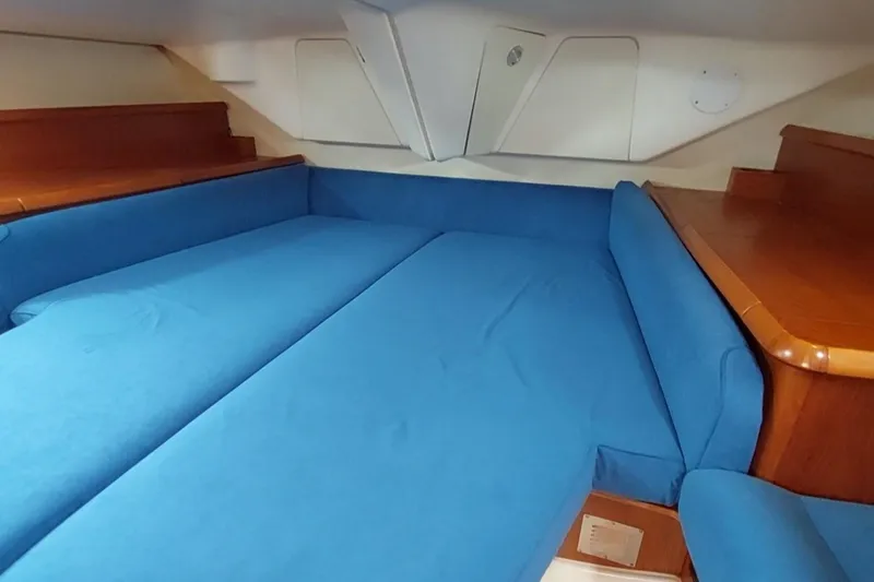 Slide: The Image of Interior cabin of 2002 Jeanneau Sun Odyssey 43 DS with blue upholstery. - 72