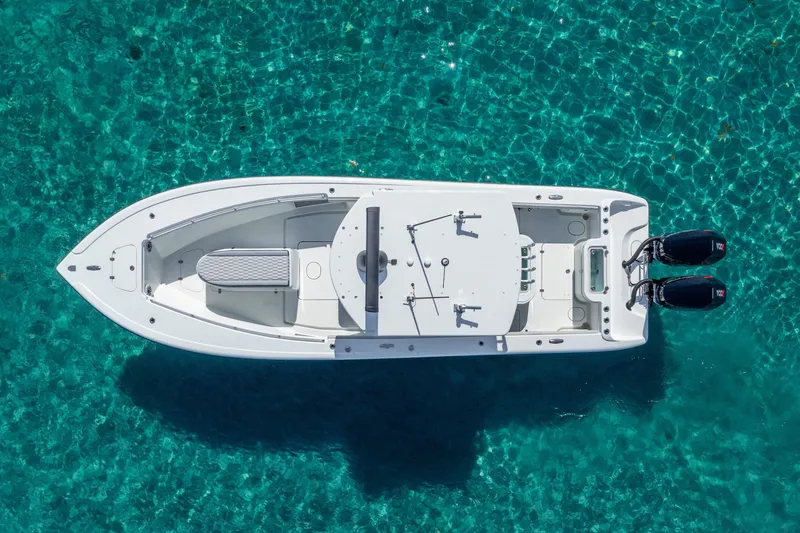 Slide: The Image of Aerial view of 2014 Yellowfin 29 Offshore boat on clear turquoise water. - 18