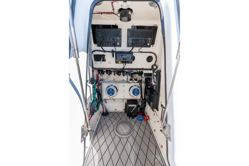 Slide: The Image of Interior view of 2014 Yellowfin 29 Offshore boat's electrical and control systems. - 37