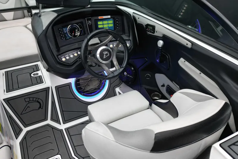 Slide: The Image of 2017 Centurion Ri237 boat interior with modern dashboard and steering wheel design. - 13