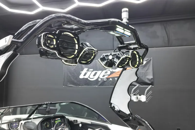 Slide: The Image of 2017 Centurion Ri237 boat with advanced audio system and sleek interior design. - 16