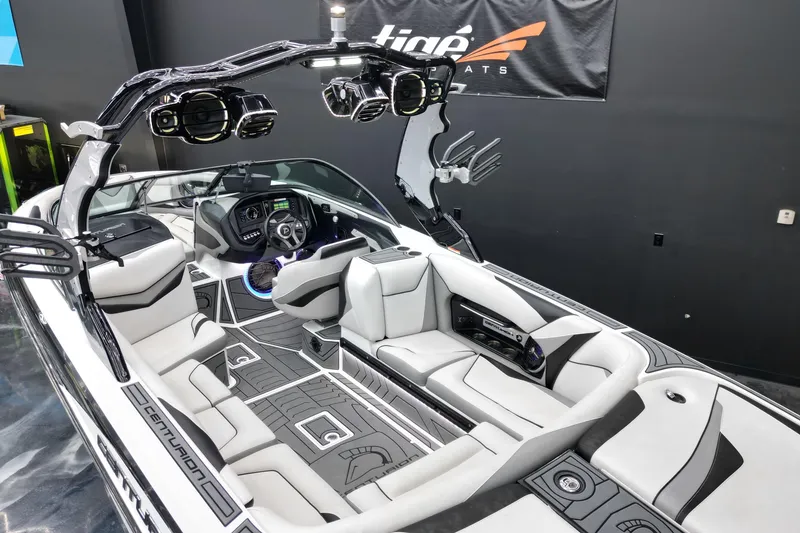 Slide: The Image of 2017 Centurion Ri237 boat interior with sleek design and advanced dashboard features. - 17