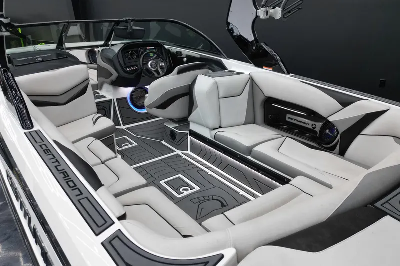 Slide: The Image of Luxurious interior of a 2017 Centurion Ri237 boat with sleek seating and modern dashboard. - 18