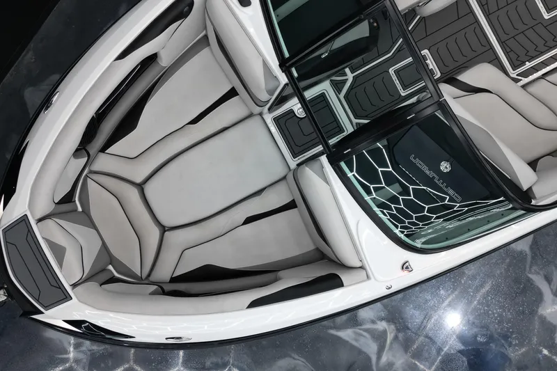 Slide: The Image of 2017 Centurion Ri237 boat interior with sleek, modern design and comfortable seating. - 6