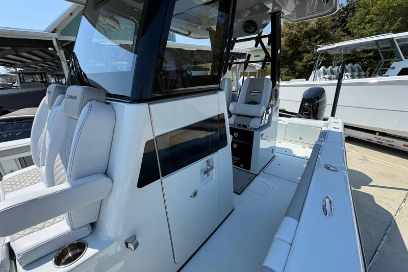 Slide: The Image of 2026 Caymas 29 CT boat interior with sleek seating and modern design. - 25