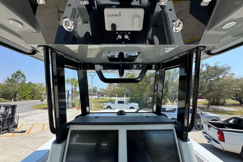 Slide: The Image of 2026 Caymas 29 CT boat interior with Garmin electronics and modern design features. - 35