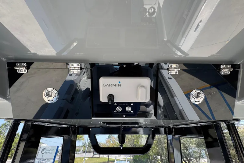 Slide: The Image of 2026 Caymas 29 CT boat with Garmin equipment and sleek storage compartments. - 36