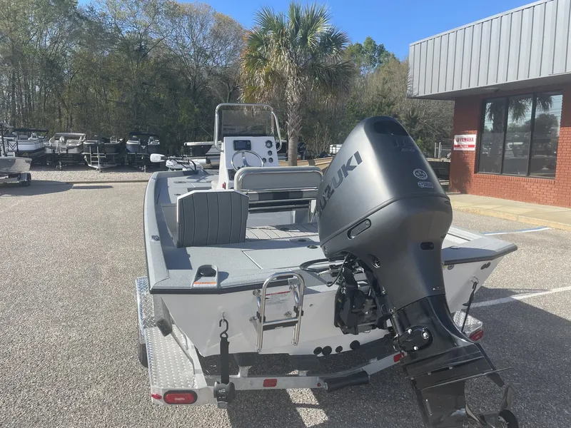 Slide: The Image of 2026 Vexus Defender 201 BAY with Suzuki 115SS engine outdoors. - 6