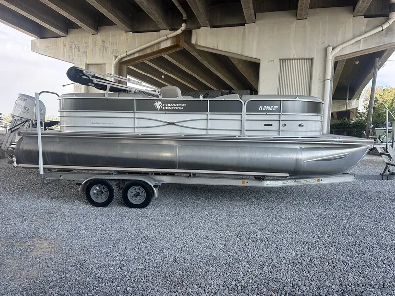 Slide: The Image of 2018 South Bay 200 Series Tritoon parked under bridge. - 5