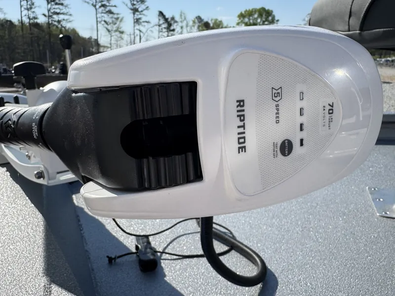 Slide: The Image of Close-up of a Riptide motor on a 2026 Xpress H20B Bay boat. - 4