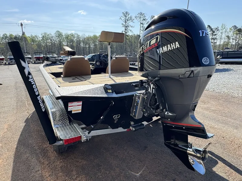 Slide: The Image of 2026 Xpress Hyper-Lift Bass H20 with Yamaha motor on trailer. - 8