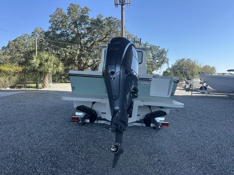 Slide: The Image of Rear view of 2026 Parker 227 Explorer boat with outboard motor. - 4