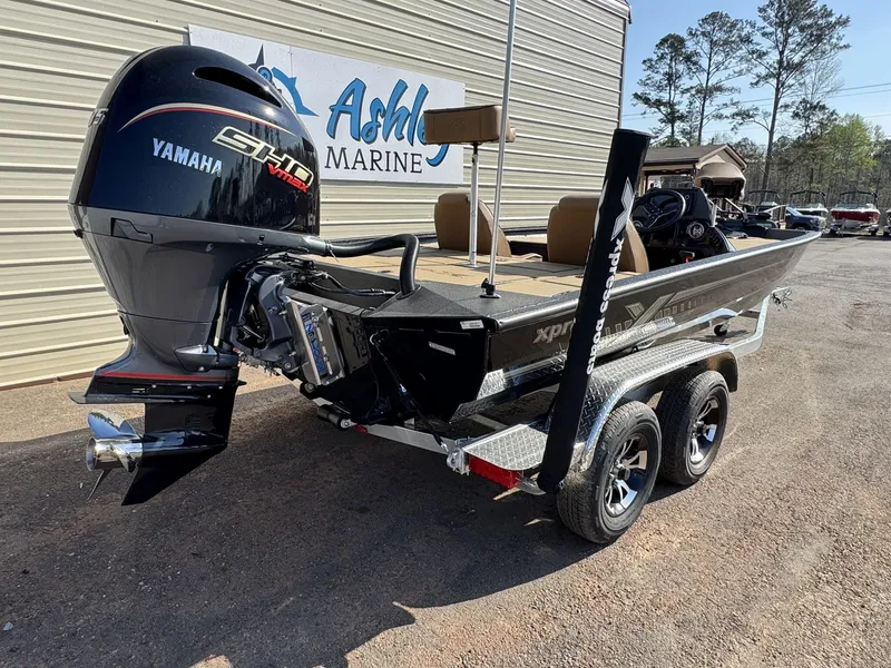 Slide: The Image of 2026 Xpress Hyper-Lift Bass H20 boat with Yamaha engine. - 7