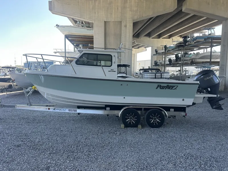 Slide: The Image of Parker 227 Explorer boat 2026 on trailer under bridge. - 6