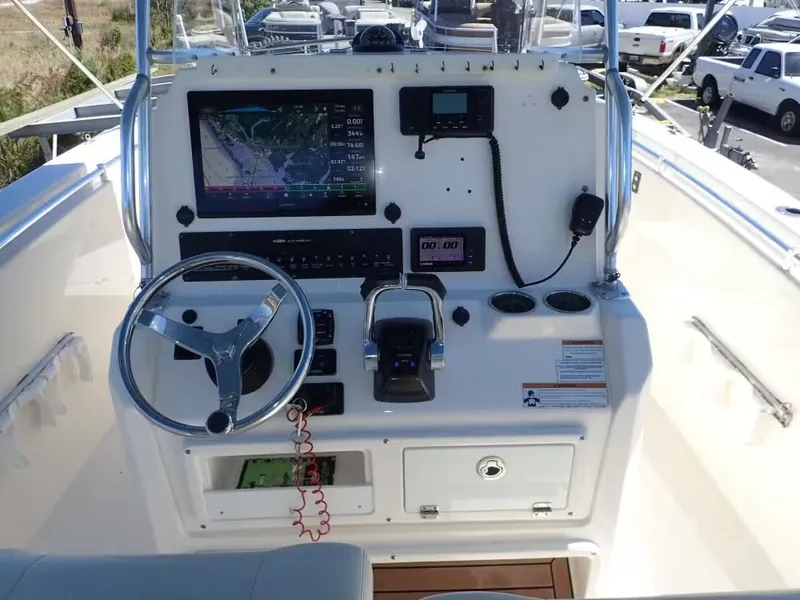 Slide: The Image of 2020 Cobia 280 Center Console boat dashboard with navigation system. - 10