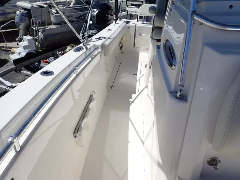 Slide: The Image of Cobia 280 Center Console 2020, boat deck view, white interior. - 13