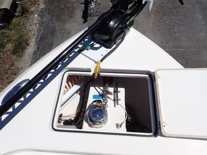 Slide: The Image of Cobia 280 Center Console 2020 with open anchor hatch. - 17