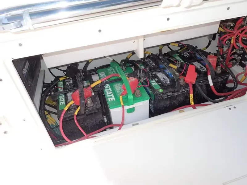 Slide: The Image of Battery compartment of a 2020 Cobia 280 Center Console boat. - 18