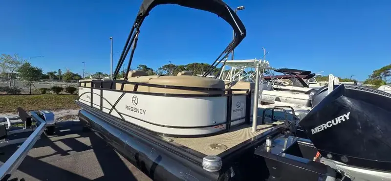 Slide: The Image of 2020 Regency 230 DL3 pontoon boat with Mercury engine. - 4